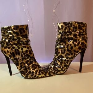 Black and gold booties, brand new, never worn.